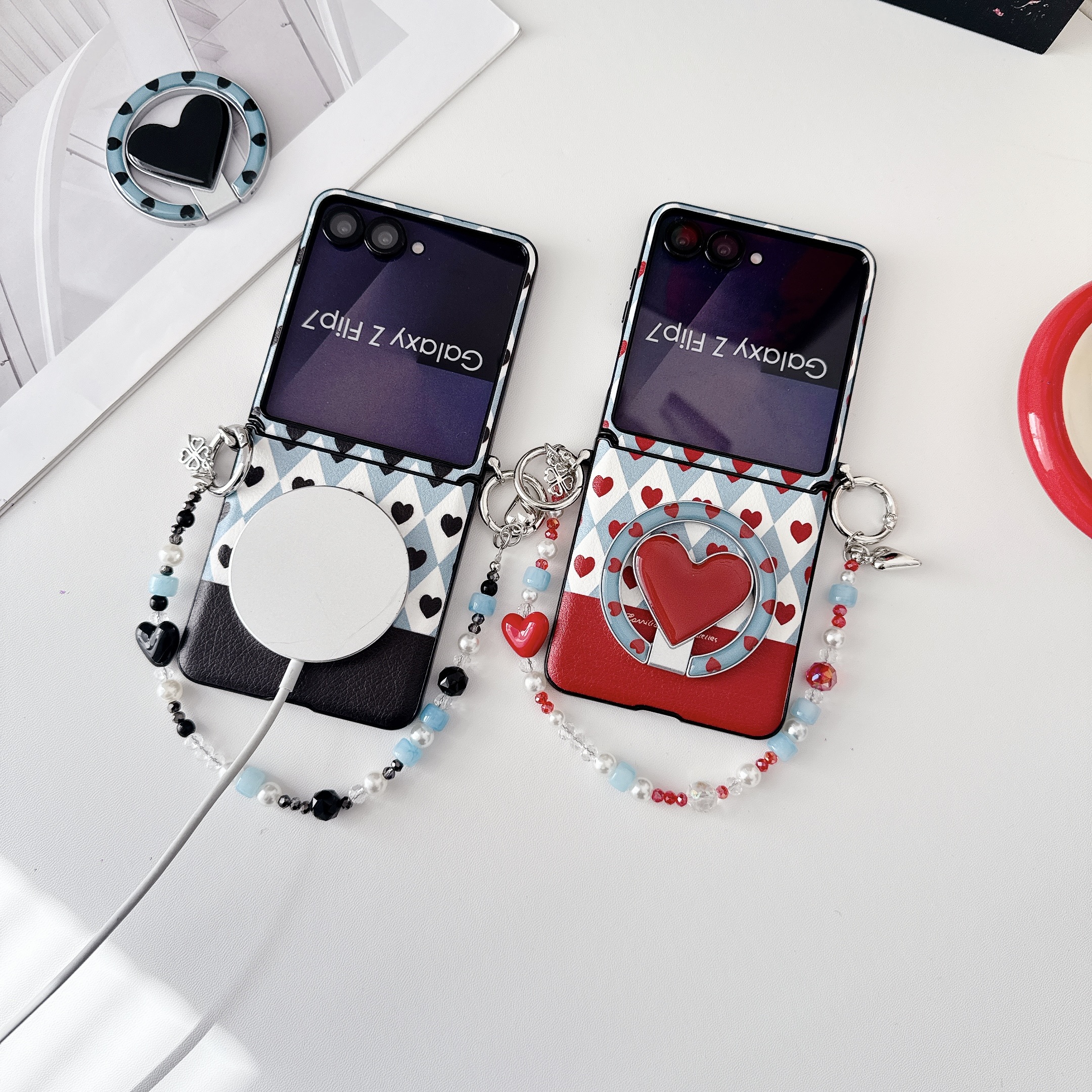 Samsung Galaxy Z Flip 7 slim phone case, featuring a detachable magnetic heart-shaped stand and a beaded hand strap. - Image 2